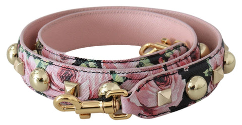 Pink floral leather shoulder strap with gold studs for bags, designed by Dolce & Gabbana, featuring vibrant floral pattern.
