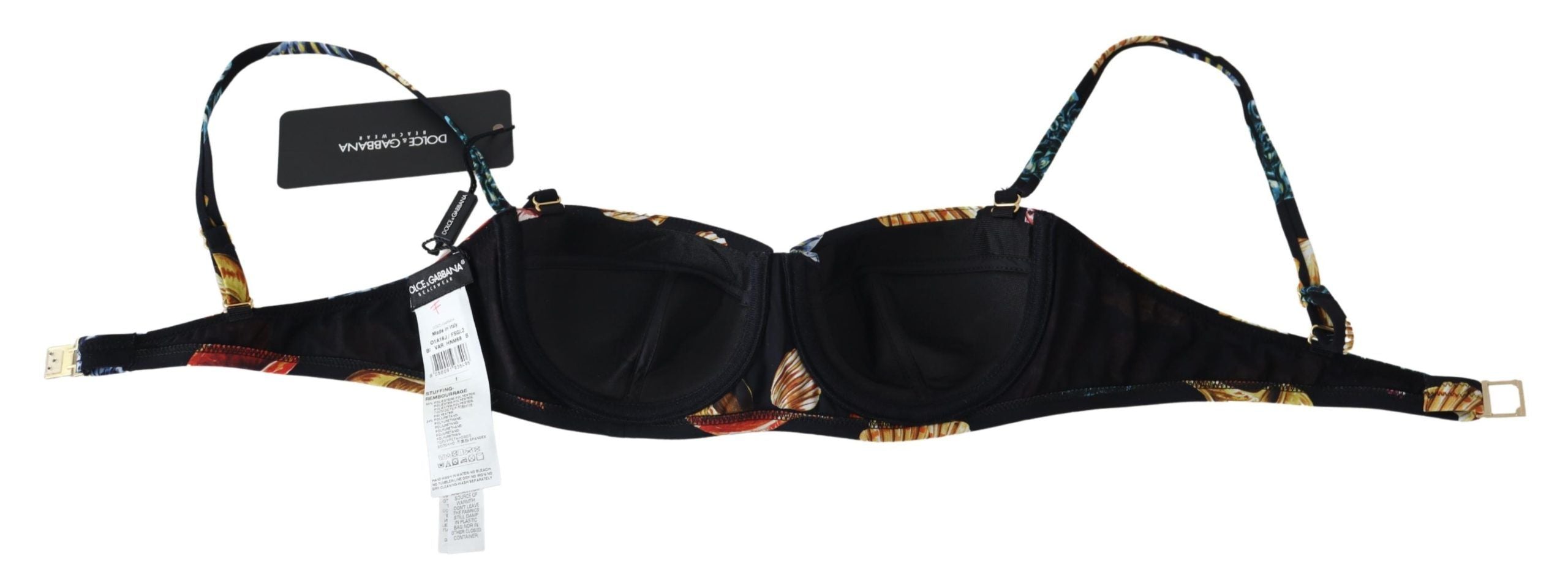 Dolce & Gabbana black seashells print women’s bikini top, stylish swimwear with seashell pattern for beach or pool.