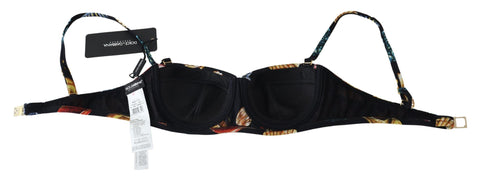 Dolce & Gabbana black seashells print women’s bikini top, stylish swimwear with seashell pattern for beach or pool.