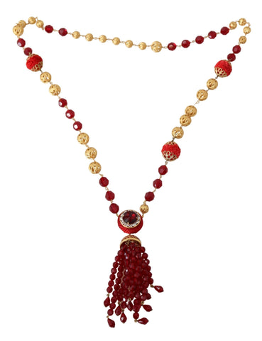 Gold tone brass necklace with red crystal pendant and opera chain from Dolce & Gabbana, featuring elegant jewelry design.