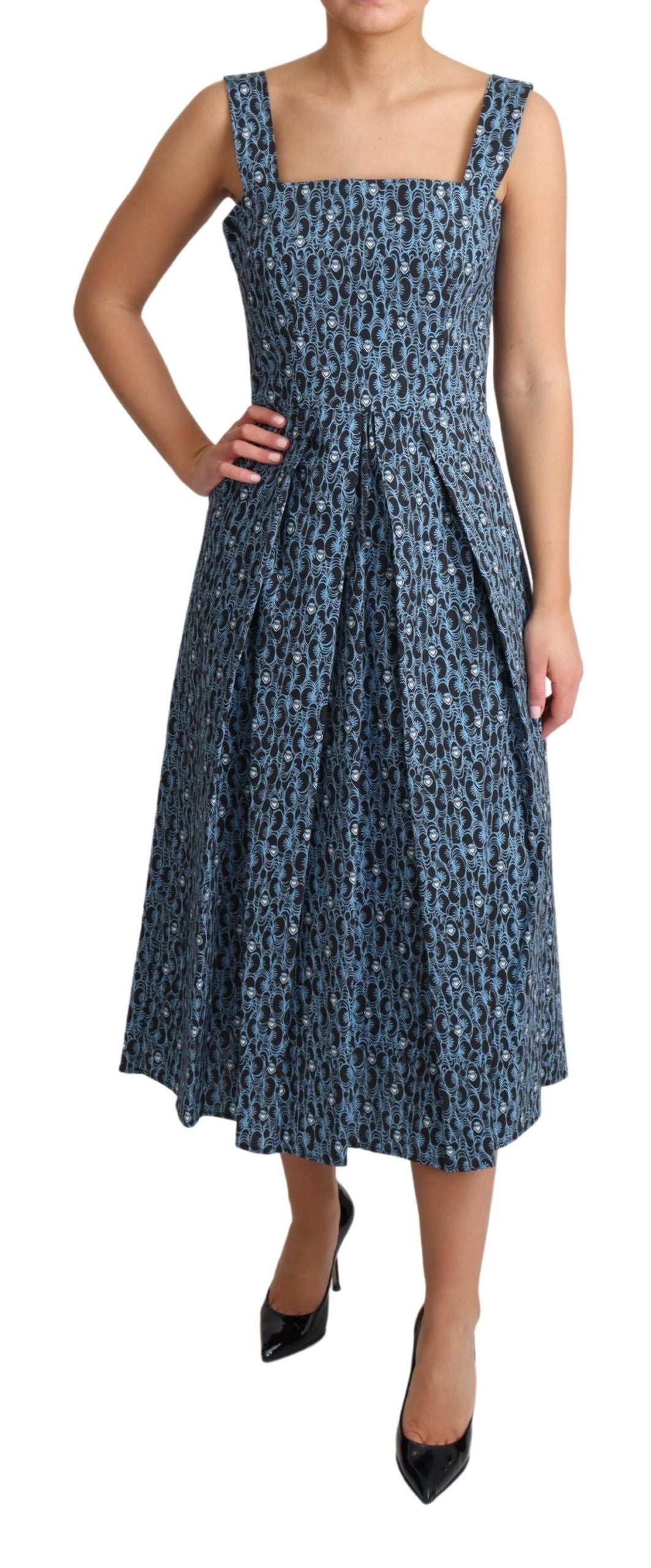 Blue heart-patterned cotton A-line stretch dress by Dolce & Gabbana, featuring a fitted bodice and flowing skirt.