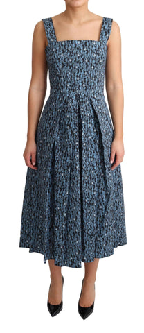 Blue heart-patterned cotton A-line stretch dress by Dolce & Gabbana, displayed on a hanger with detailed fabric close-up.