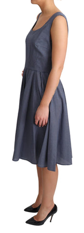 Blue polka dot cotton A-line stretch dress by Dolce & Gabbana, shown lying flat with a fitted waist and flowy skirt.