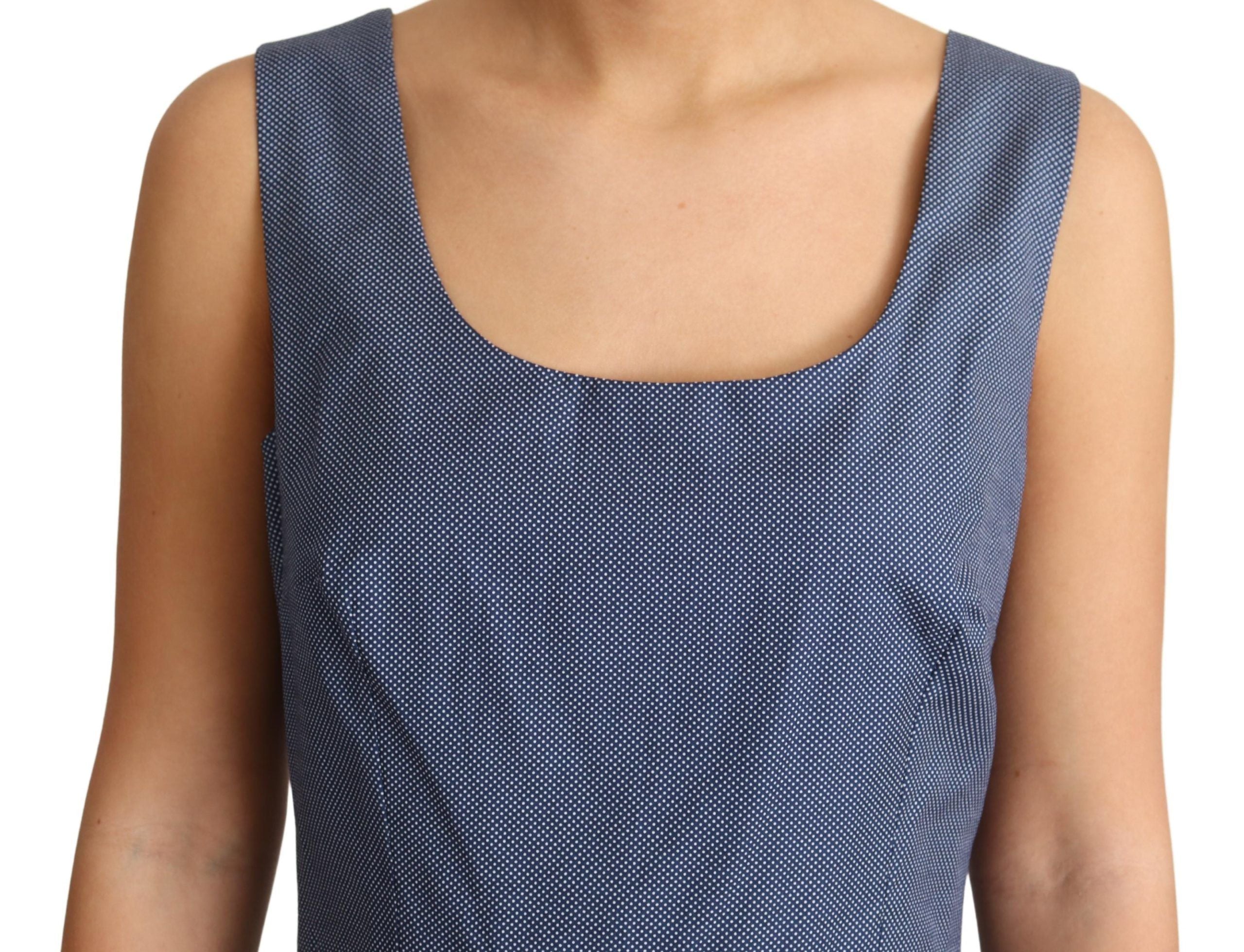 Blue polka dot cotton A-line stretch dress by Dolce & Gabbana, shown on a model with a fitted waist and flared skirt.