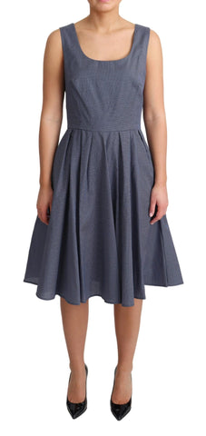 Blue polka dot cotton A-line stretch dress by Dolce & Gabbana displayed on a hanger.
