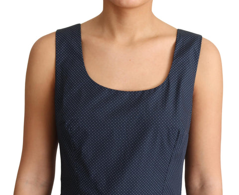 Blue polka dotted cotton A-line dress by Dolce & Gabbana with a fitted bodice and flared skirt, displayed on a hanger.