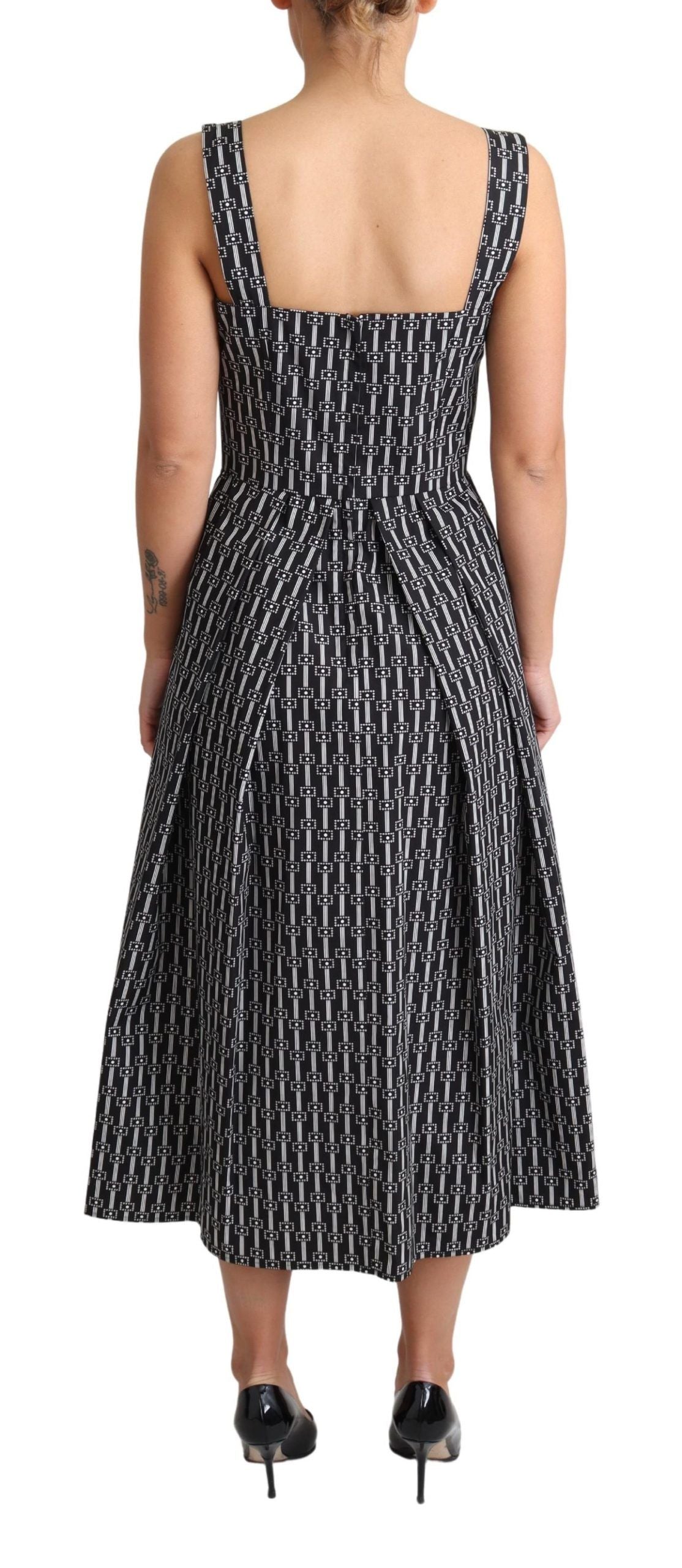 Black and white patterned cotton A-line dress by Dolce & Gabbana, featuring a stylish and elegant design.