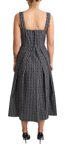 Black and white patterned cotton A-line dress by Dolce & Gabbana, featuring a stylish and elegant design.
