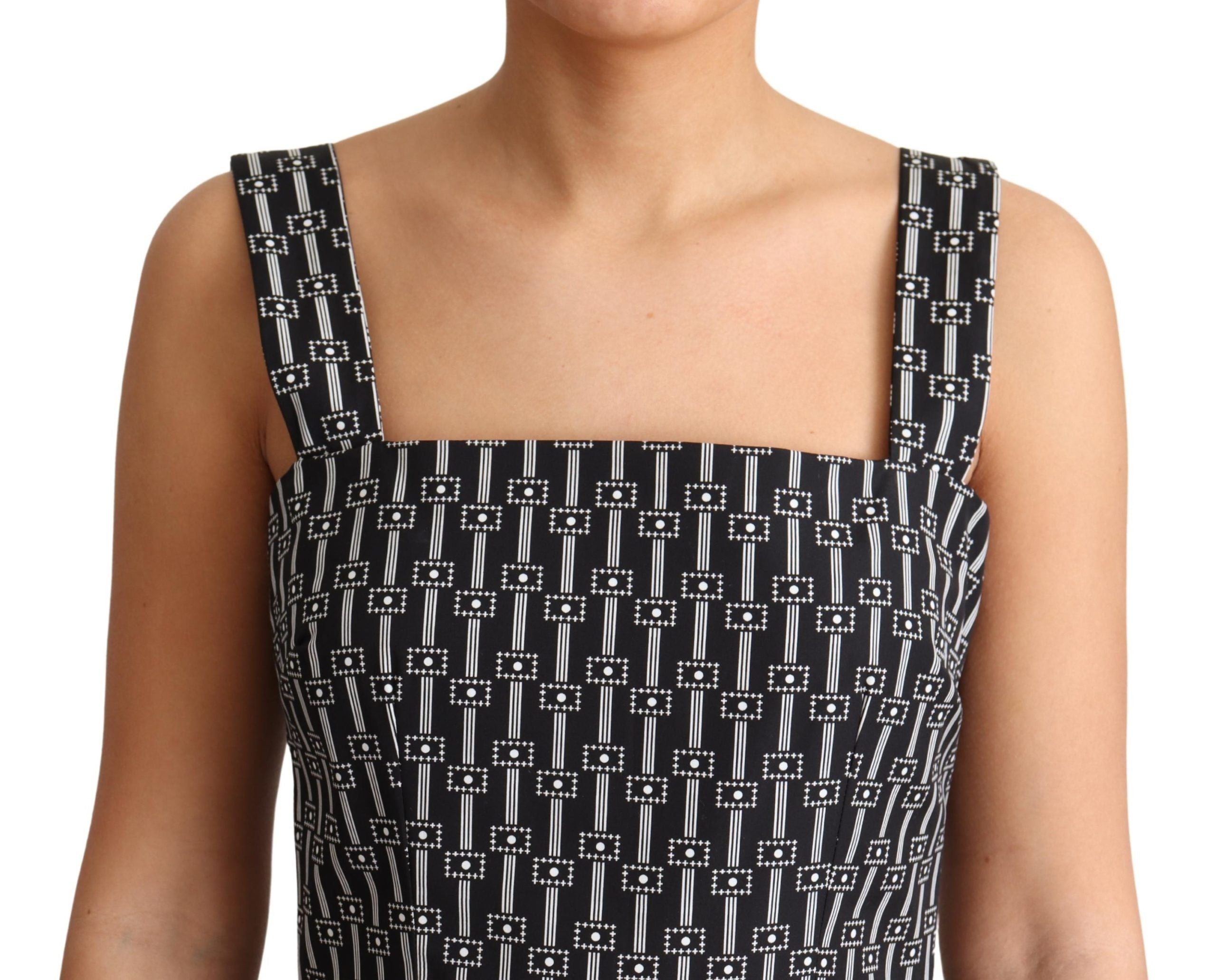 Black and white patterned cotton A-line dress by Dolce & Gabbana, with a fitted waist and flared skirt.