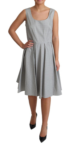 Gray polka dotted cotton A-line dress by Dolce & Gabbana, featuring a classic silhouette and playful pattern.