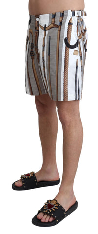 White Dolce & Gabbana walking stick beachwear shorts with a stylish design, perfect for swimming or beach outings.