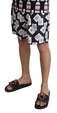Black card deck print Dolce & Gabbana swimshorts with beachwear style, featuring bold card graphic and comfortable fit.