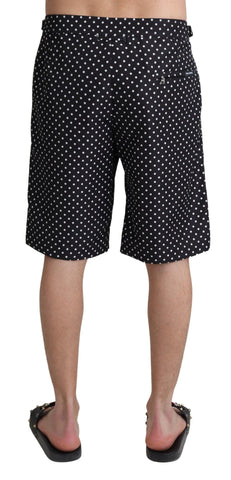 Black polka dots Dolce & Gabbana beachwear shorts for swimming, featuring lightweight fabric and a stylish, relaxed fit.