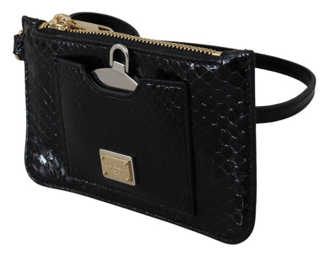 Black leather coin purse wristlet with mirror and Agnese wallet design by Dolce & Gabbana, featuring compact, stylish accessories.