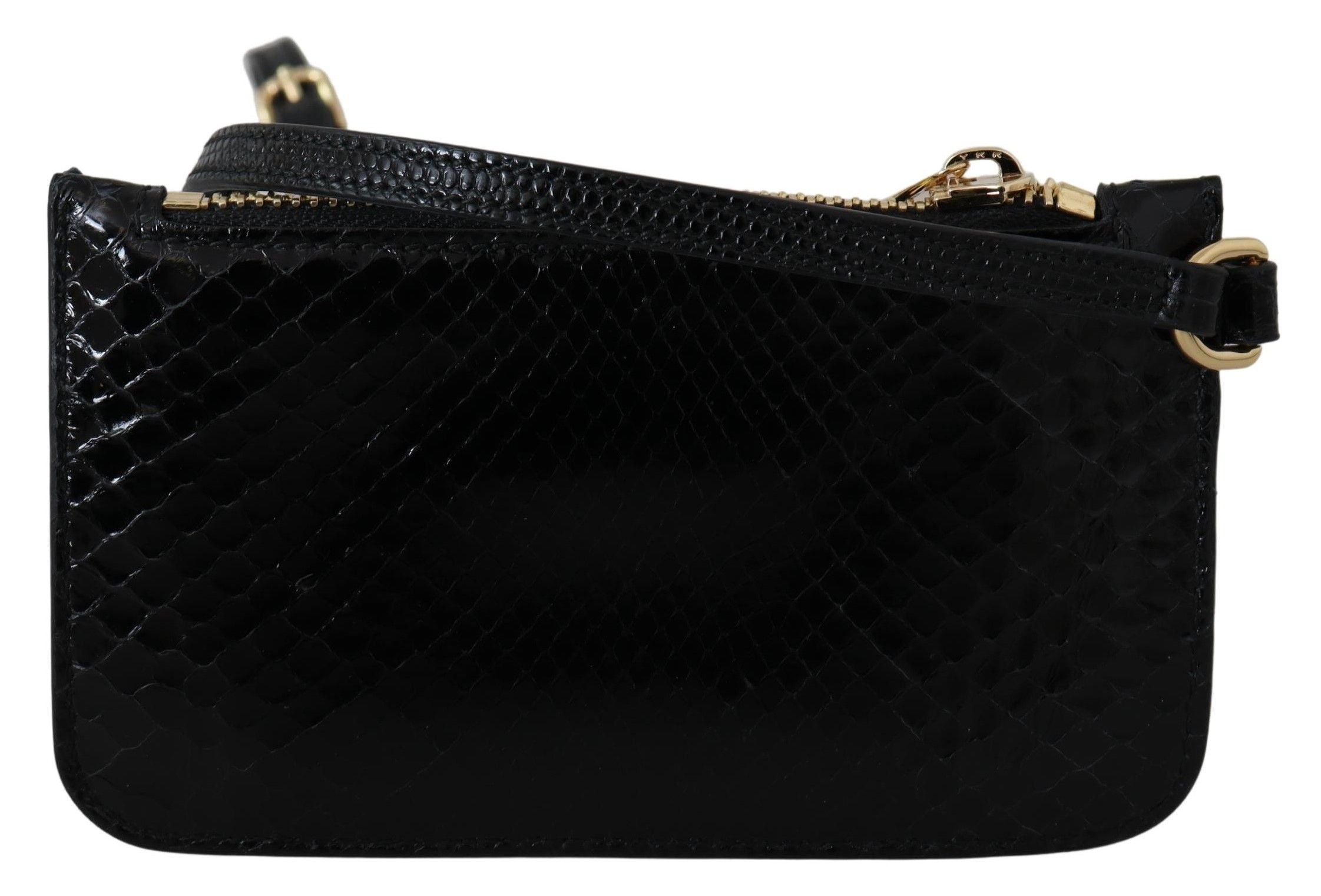 Black leather coin purse wristlet with mirror from Dolce & Gabbana, featuring sleek Agnese wallet design.
