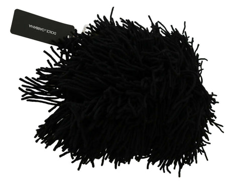 Black and white knitted cashmere animal design hat by Dolce & Gabbana, featuring cozy texture and playful animal motifs.