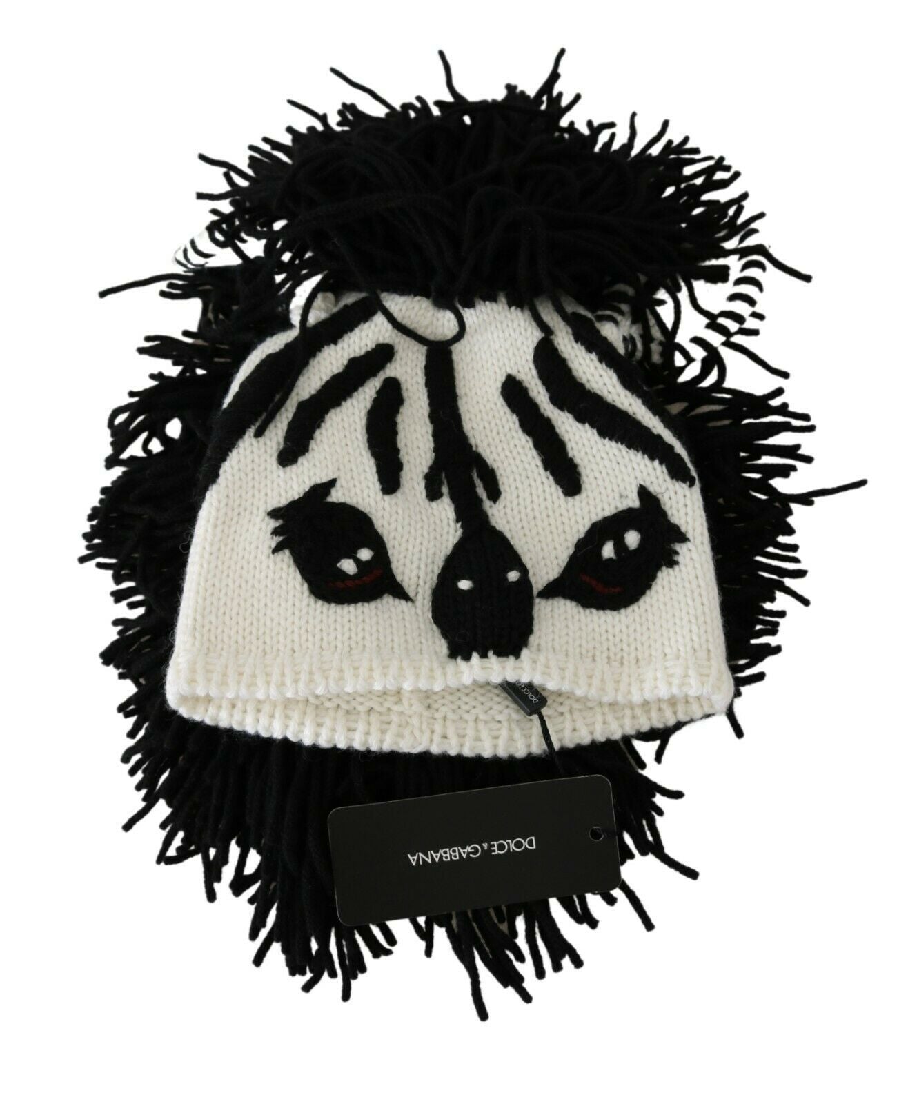 Black and white knitted cashmere hat with animal design from Dolce & Gabbana, featuring a cozy, stylish winter accessory.