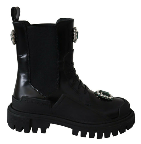 Black leather combat boots with crystal embellishments from Dolce & Gabbana, featuring rugged soles and stylish lacing.
