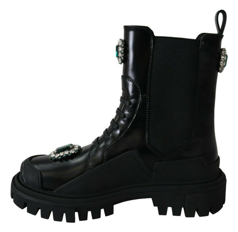 Black leather combat boots with crystal embellishments from Dolce & Gabbana, featuring sturdy soles and lace-up design.