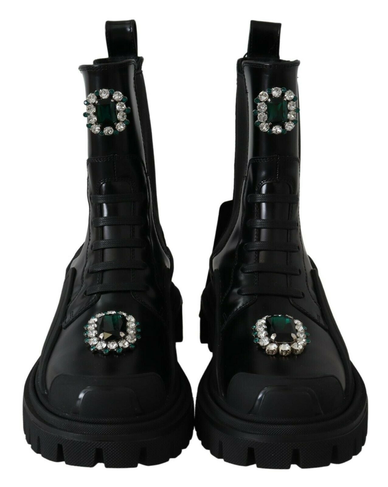 Black leather crystal-embellished combat boots by Dolce & Gabbana, featuring rugged soles and decorative crystals.