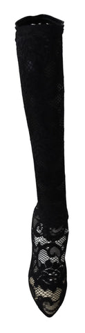 Black Taormina lace sock boots by Dolce & Gabbana featuring a sleek design and pointed pumps with lace detailing.