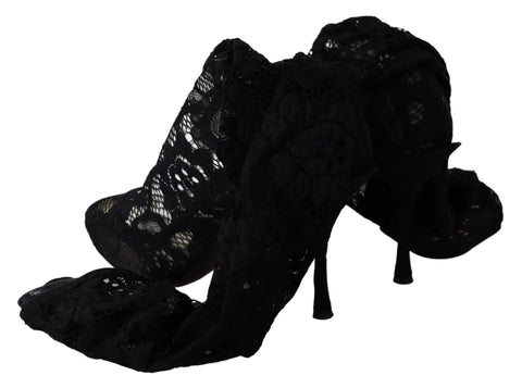 Black Taormina lace socks boots by Dolce & Gabbana, featuring lace detailing, sleek pumps design, and stylish ankle-high silhouette.
