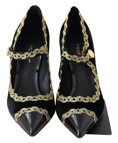 Black velvet Mary Jane pumps with gold accents by Dolce & Gabbana, featuring a classic strap and elegant design.