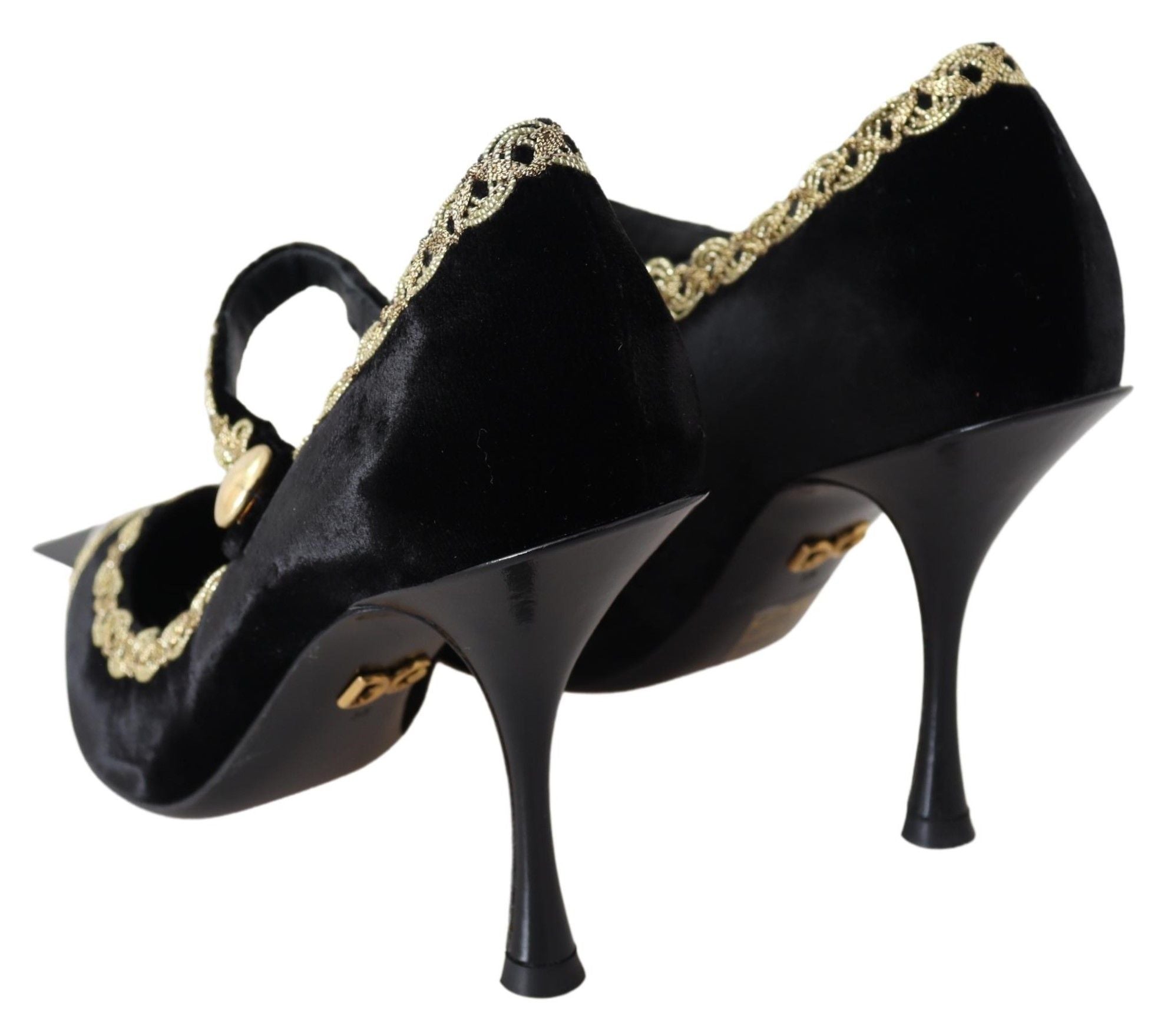 Black velvet Mary Jane pumps with gold accents by Dolce & Gabbana, featuring a classic strap and rounded toe.