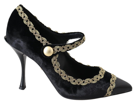 Black velvet Mary Jane pumps with gold accents from Dolce & Gabbana, featuring a classic strap and rounded toe.