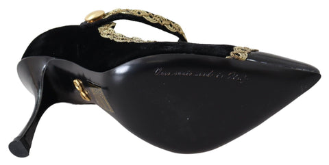Black velvet Mary Jane pumps with gold accents from Dolce & Gabbana, featuring a classic strap and elegant low heel.