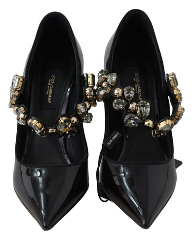Black leather Mary Jane pumps with crystal embellishments by Dolce & Gabbana, featuring a classic strap and elegant design.