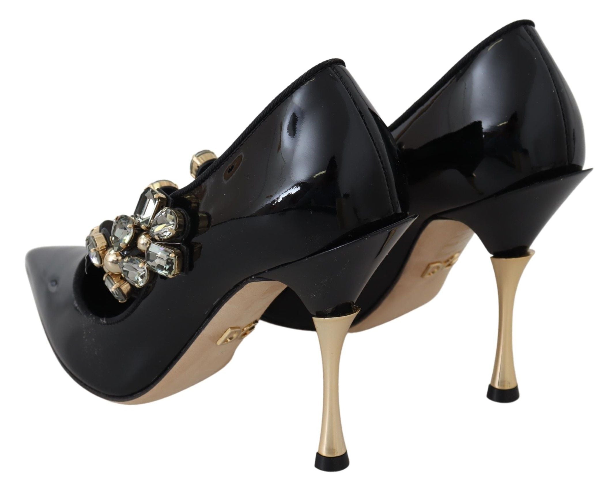 Black leather Mary Jane pumps with crystal embellishments from Dolce & Gabbana, stylish shoes with ankle straps and rounded toes.