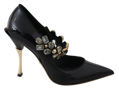 Black leather Mary Jane pumps with crystal embellishments by Dolce & Gabbana, featuring a classic shoe design with a stylish touch.