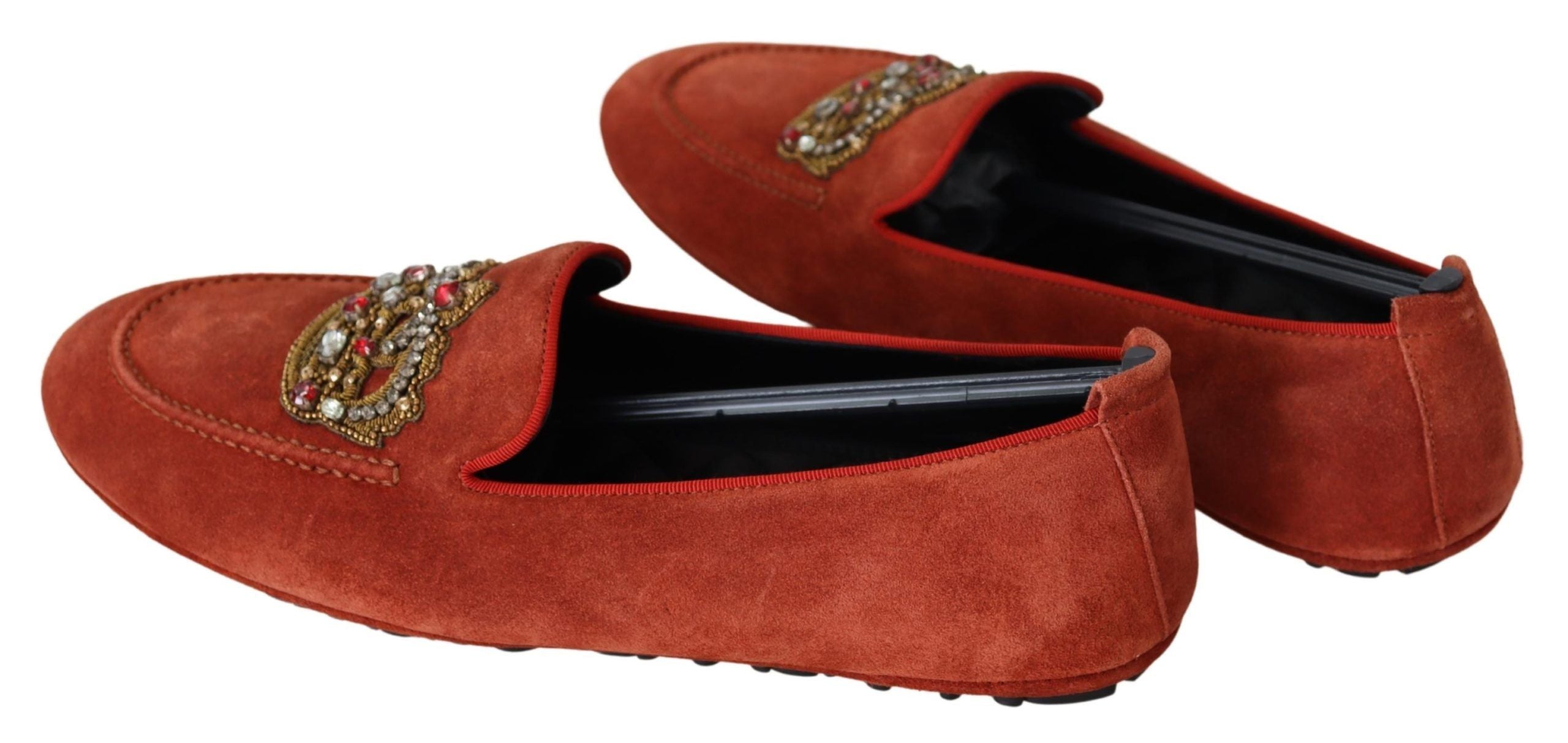 Orange leather crystal crown loafers by Dolce & Gabbana featuring decorative crystal embellishments and slip-on design.