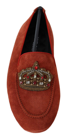 Orange leather crystal crown loafers by Dolce & Gabbana with decorative crystal embellishments and sleek slip-on design.