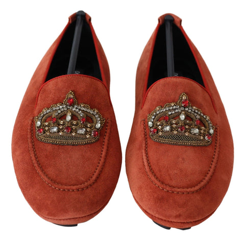 Orange leather crystal crown loafers by Dolce & Gabbana featuring decorative crystals and stylish slip-on design.