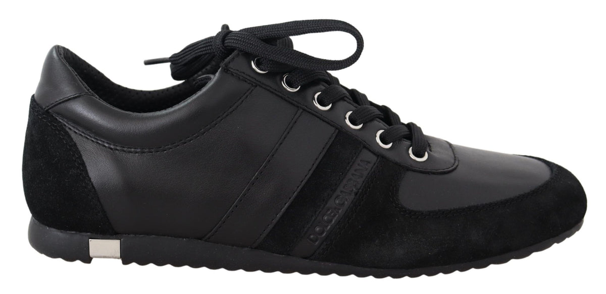 Black leather casual sneakers with Dolce & Gabbana logo branding, stylish and comfortable footwear for everyday wear.