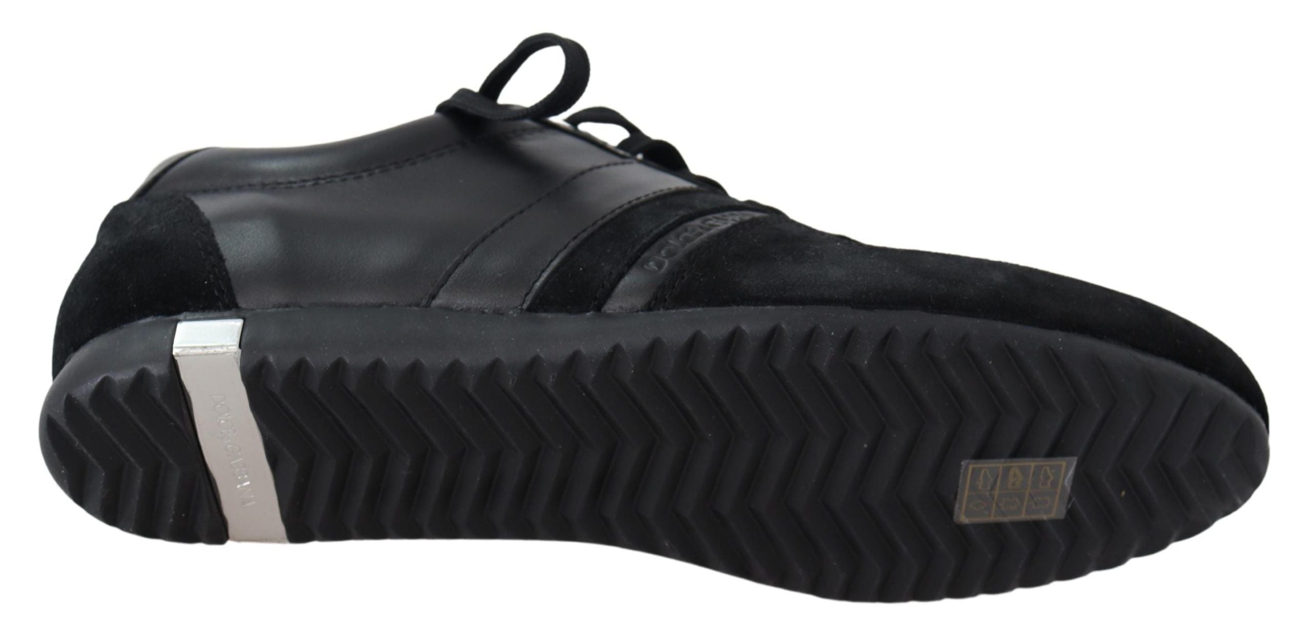 Black Dolce & Gabbana leather casual sneakers with logo detail and white rubber sole, stylish and comfortable footwear.
