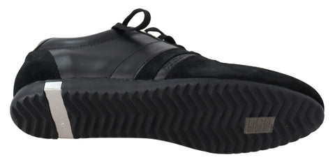 Black Dolce & Gabbana leather casual sneakers with logo detail and white rubber sole, stylish and comfortable footwear.