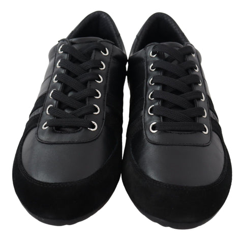 Black leather casual sneakers with Dolce & Gabbana logo, featuring a sleek design and white rubber sole.