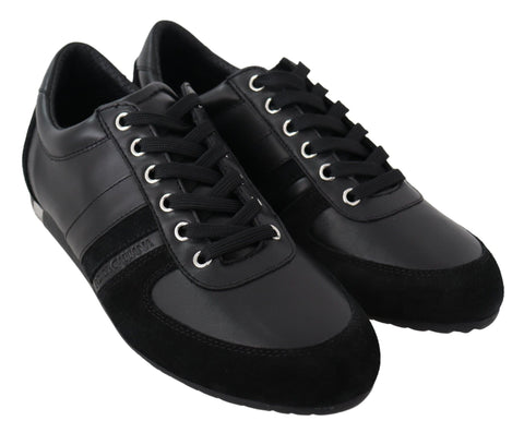 Black leather casual sneakers with Dolce & Gabbana logo, stylish slip-on shoes for everyday wear.