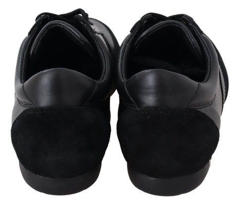 Black leather casual sneakers with Dolce & Gabbana logo, featuring a sleek design and comfortable sole.