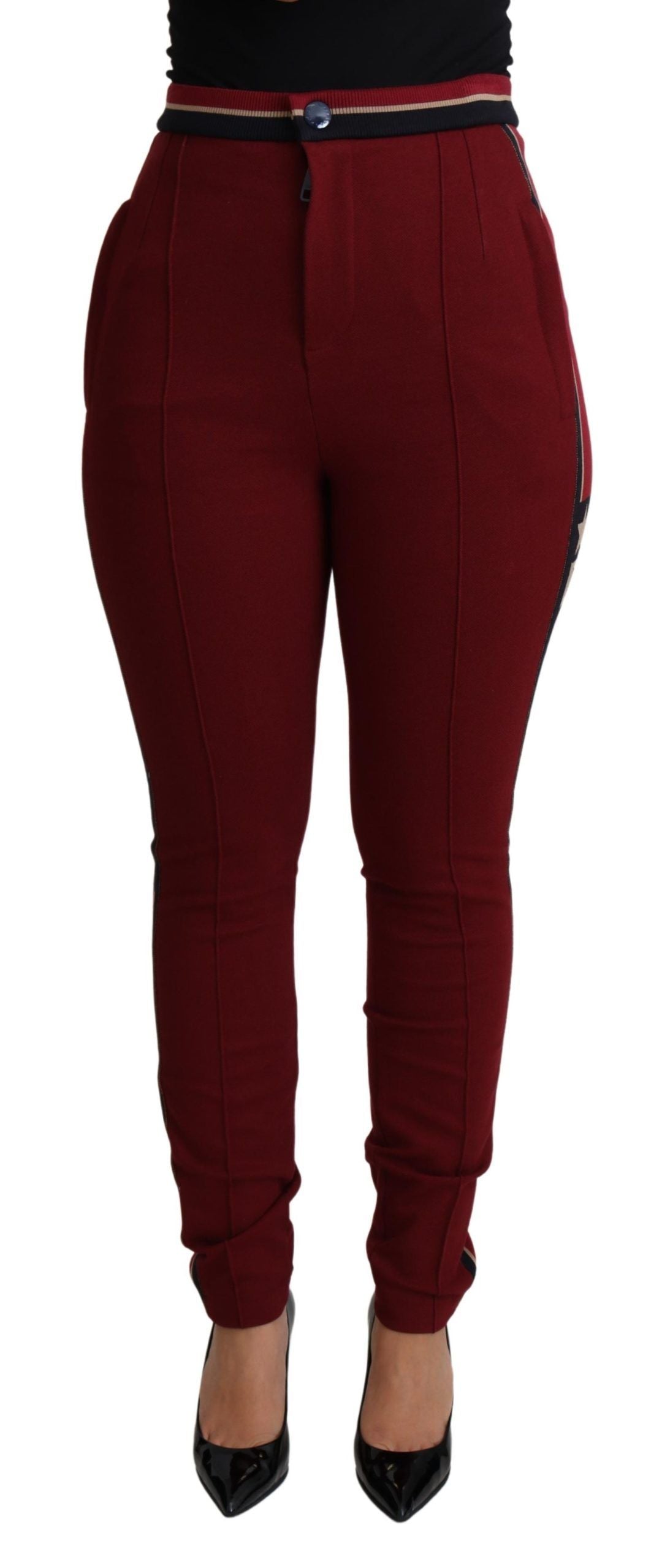 Red Dolce & Gabbana star-striped skinny cotton pants with a fitted silhouette and bold pattern.