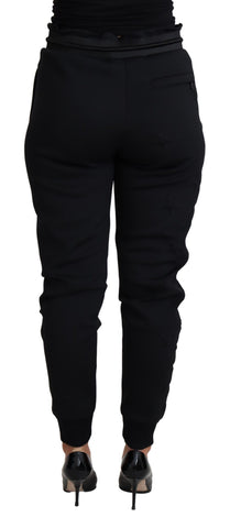 Black polyester neoprene jogger trousers by Dolce & Gabbana with a relaxed fit and elastic waistband.