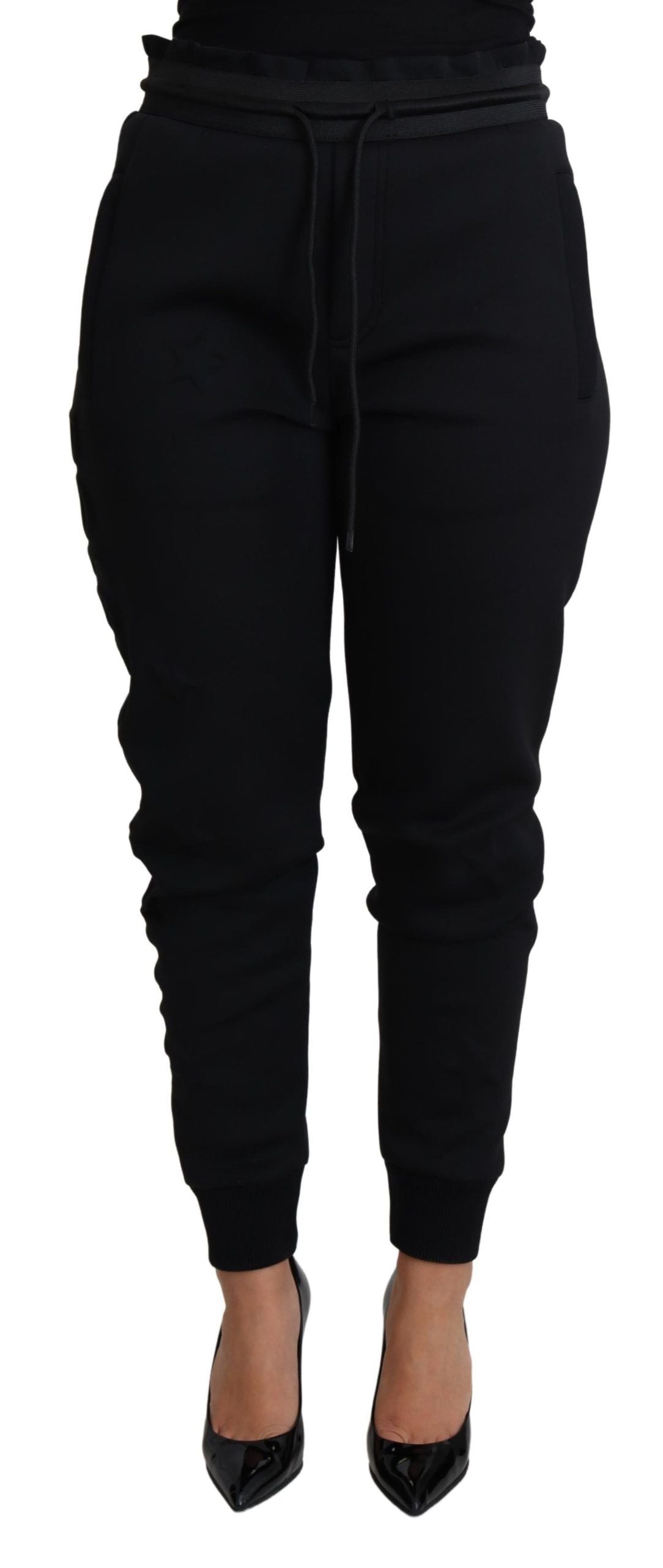 Black polyester neoprene jogger trousers by Dolce & Gabbana, featuring a sleek, modern fit with elastic waistband and tapered legs.