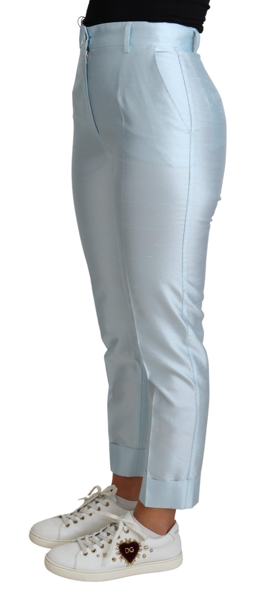 Light blue silk cropped tapered trousers by Dolce & Gabbana, featuring a smooth fabric and tailored fit.