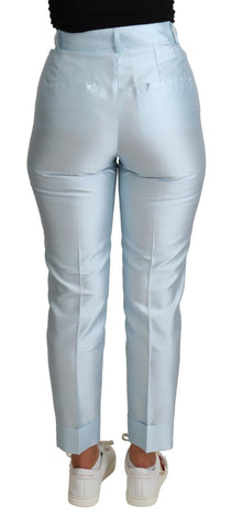 Light blue silk cropped tapered trouser pants by Dolce & Gabbana, showcasing smooth fabric and tailored fit.