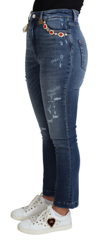Blue embellished skinny cotton jeans by Dolce & Gabbana with decorative details and a fitted style.