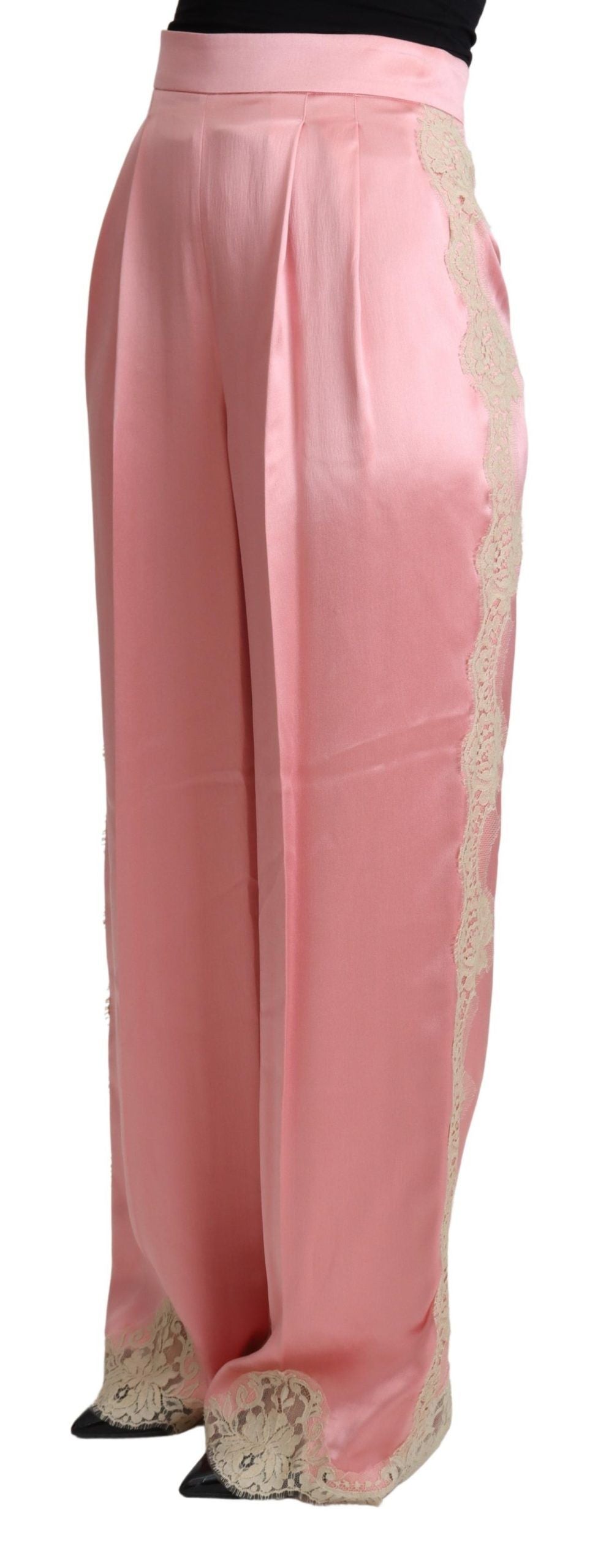 Pink silk satin wide-leg pants with lace trim by Dolce & Gabbana, featuring a smooth, flowing fabric and elegant design.