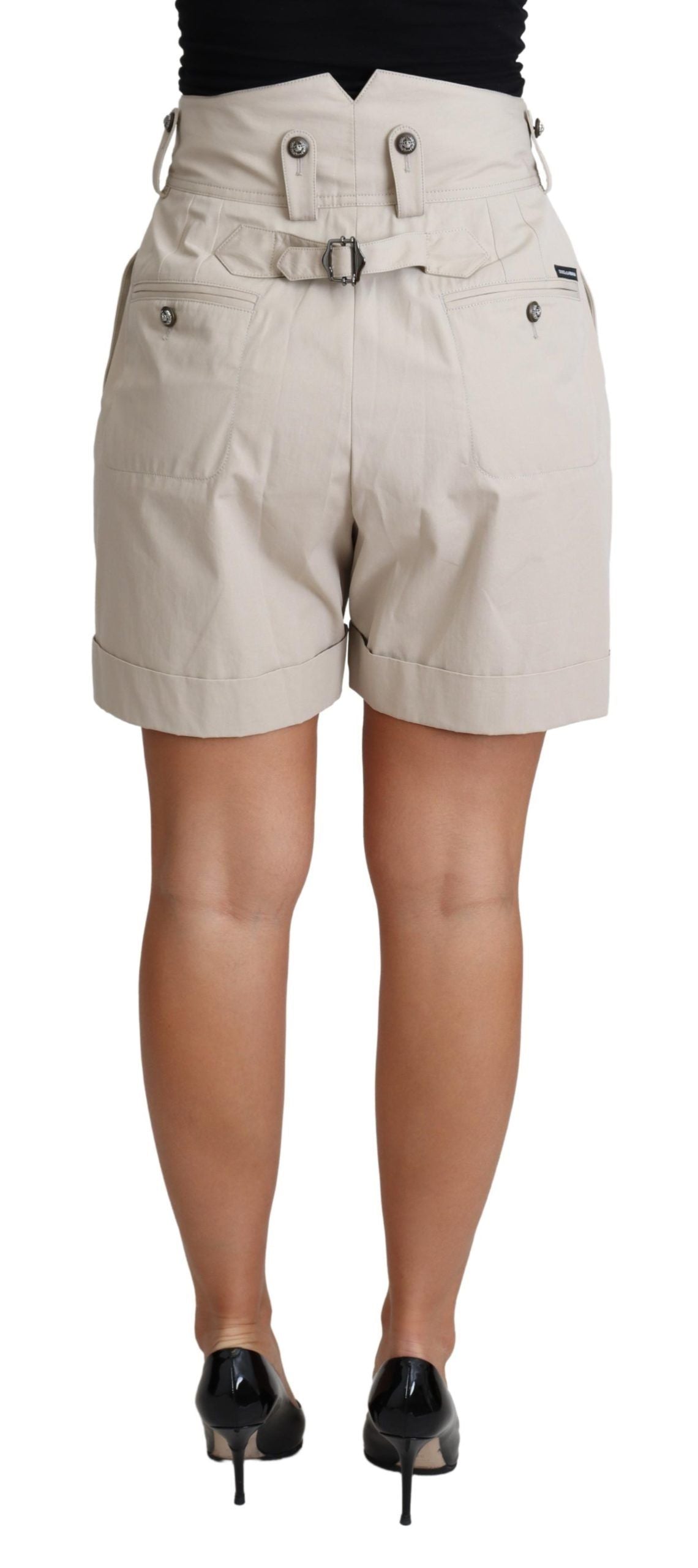 Beige cotton pleated high-waist casual shorts by Dolce & Gabbana, showing front view with pleats and high-rise fit.